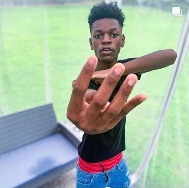 What Does It Mean When a Guy Poses with 4 Fingers