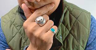 What Does It Mean When a Guy Wears a Ring on His Middle Finger
